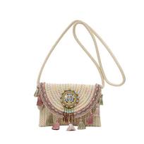Popular straw woven bags, new seaside literary women's woven bags, ethnic style niche versatile fringed messenger bags