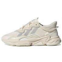 Adidas Ozweego Ekrū atspalvio Unisex sportbačiai Kreminiai Core-Black Mėlyni-Rush GW9448 36