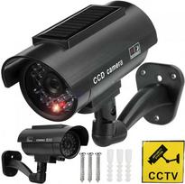 Atrapa Netikra CCTV kamera su saulės stebėjimo kamera, mirksinčia LED lempute ant sienos