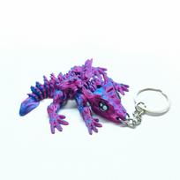 Sąnarių 3D spausdintas kūdikio drakono raktų pakabukas: Šviečiantis dekompresinis žaislas & Rankdarbių dovanos ornamentas blue