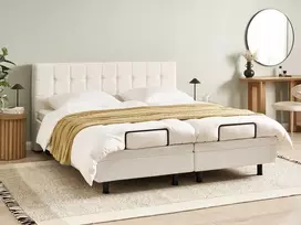 Beliani Reguliuojama lova Boucle DUKE 180 x 200 cm, kreminė balta
