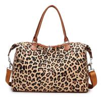 High-value luggage bag, large-capacity short-distance milk leopard print messenger bag, outdoor sports fitness bag. leopardo rašto spalva