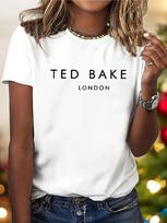 Tedbake London Šis minkštas, tampus, grafinio rašto marškinėlis unisex tinka kasdienai, su apvalia iškirpte ir trumpomis rankovėmis. Galimas įvairių spalvų. 4XL black