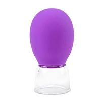 Facial Cupping Device for Pulling and Extracting The Fire Cupping Technique To Remove The Real Bruises on The Face. Facial Pressure Cupping Device purple purple