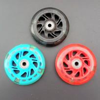 Universal Flashing Wheels for Ice Skates, Roller Skates, Scooters, and Wiggle Cars 65mm with lights black