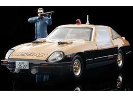 PRE-ORD3R Tomica Limited Vintage Modeliukas 1/64 Movie Stars 01 Seibu Keisatsu Super Z with Keisuke Daimon Figure, gold/black