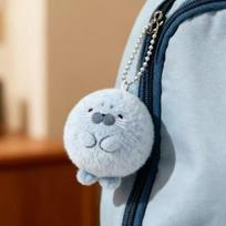 Adorable Kawaii Gray Seal Dumpling Plush Keychain with Red Book Cartoon Style gray