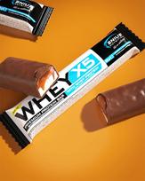 Whey-X5 Protein Bar Coconut & Caramel – Traškus ir gardus baltyminis batonėlis | Genius Nutrition | 48 g - roasted-coconut-milk-chocolate