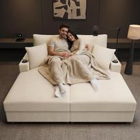 Dvigulė sofa-lova su miego funkcija, telefono laikikliu, USB jungtimi ir puodelio laikikliu. Tinka svetainei, miegamajam ar namų kino teatrui. Smėlio spalvos. 163 x 140 x 82 cm smėlis