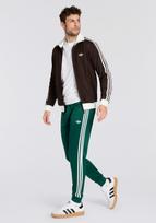 ADIDAS ORIGINALS Kelnės 'SUPERSTAR' tamsiai žalia / balta