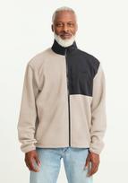 JACK WOLFSKIN Funkcinis flisinis džemperis smėlio spalva / juoda