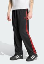 ADIDAS ORIGINALS Kelnės 'Adicolor' omarų spalva / juoda