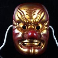 Vibrant Tengu Mask In Bold Red And Gold Ideal For Halloween And Costume Events Gold Tengu Mask brown