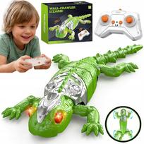 Nuotoliniu būdu valdomas GECKO sienomis laipiojantis roplys robotas su LED akimis