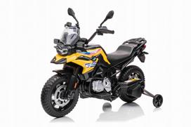 Vaikiškas elektrinis motociklas BMW F850 GS, geltonas, su pagalbiniais ratukais ir garso funkcija