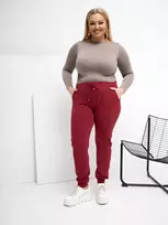 Sportinės kelnės moterims bordo spalvos plus size