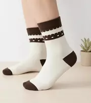 Šiltos smėlio spalvos kojinės su rudu akcentu Sella