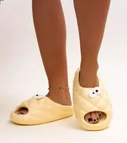 Smėlio spalvos Crocs“ tipo šlepetės su Gorgonės akimis