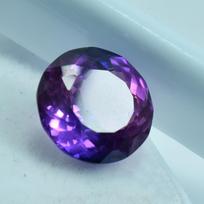 Natūralus violetinis tanzanitas, laisvas brangakmenis, apvalaus pjūvio, 10,50 ct, papuošalų gamybai ir brangakmenių kolekcijoms 12.8 mm approx violetinė