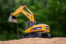 Huina NUOTOLINIO PULTO VALDOMAS RC EKSKAVATORIUS 2 viename METALINIS KAUŠAS IR GRIB H-ŽAISLAI