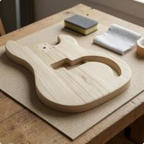 Neužbaigtas bosinės gitaros korpusas, išpjautos ertmės, instrumentų dalis, „pasidaryk pats“, individualus pritaikymas white