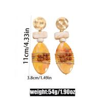 Vintage Geometric Three-Dimensional Earrings: Handmade Turmeric Oval Dangle Ornaments for Women geltona