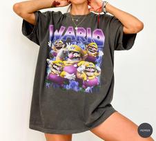 Vintažiniai Wario ir vaikų marškinėliai, Super Mario piktadario grafinis marškinėlis, Comfort Colors Super Mario Bros ir vaikų marškinėliai, Nintendo World Vacation marškinėlis 3XL black