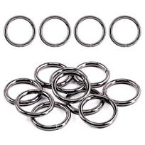 Metaliniai 25 mm žiedai rankinėms, sidabriniai, 60 vnt.