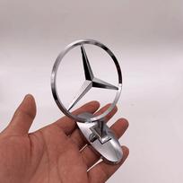 Mercedes-Benz emblem, Mercedes-Benz front emblemhood emblem car logo3D metal emblem for the hood of a Mercedes-Benz white