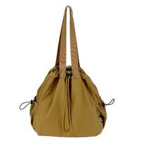 Handheld strap shoulder bag Japanese lazy wind light versatile cloth bag women Korean version simple commuter backpack women juoda