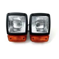 JCB ekskavatoriaus priekinio žibinto komplektas su lempute, 2 vnt. rinkinys DALIES NR. 700/38400 |Tinka