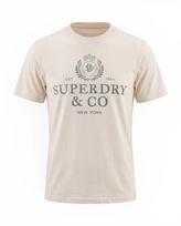 Superdry & Co Marškinėliai '1954 Company' nebalintos drobės spalva / nendrių spalva