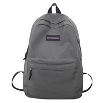 Ši kuprinė yra madinga studentiška kuprinė tiek vyrams, tiek moterims, paprasta ir universali, su koledžo stiliumi kasdienėms kelionėms. 34cm *15cm *46cm pilka spalva