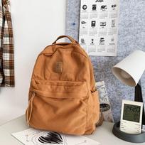 Japanese Niche Retro Lazy Wind Pendant Feeling Backpack Female Washed Canvas Schoolbag Casual College Student Class Backpack šviesiai ruda spalva