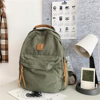 Japanese Niche Retro Lazy Wind Pendant Feeling Backpack Female Washed Canvas Schoolbag Casual College Student Class Backpack žalia