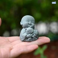 Embracing Animal Monk Statue,Sandstone Finish Zen Baby Buddha Figurine,Mini Spiritual Decor for Home,Office & Garden gray