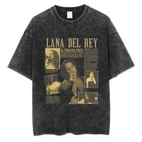 Per dydžio rūgštiniu būdu išplėtėtas trumpomis rankovėmis marškinėlis su Lana Del Rey dainos „Say Yes To Heaven“ širdies formos šūkiu ir grafiniu spaudiniu S dramblio kaulas