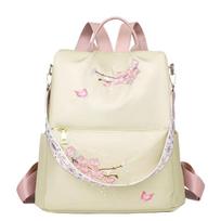 Neutral style backpack for men and women, suitable for daily travel and outings. Features a rear zipper with printed design.