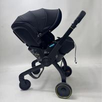 Kūdikio 4-in-1 automobilinė kėdutė ir vežimėlis (sėdimas-gulimas) (0-24 mėn) juoda