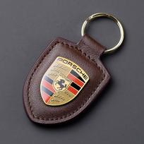 Odinis skydo emblema Automobilio raktų pakabukas Metalinis prabangus raktų pakabukas Porsche Cayenne Panamera Macan 911 718 Taycan Boxster Cayman 918 kava