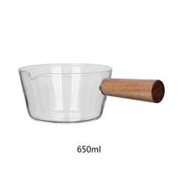 Stiklinis puodas Pienas greitai paruošiamų makaronų sriubos žaliavos košės puodai medinėmis rankenomis, šildoma atvira liepsna Virtuvės indai Molinis puodas 650ML white