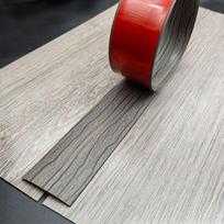 Lipni palangės uždengimo juosta Kilimo prie plytelių krašto apdailos juosta NAUJA Grindų perėjimo juosta Durų angai Dark Grey Wood Grain