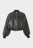 Nike Sportswear Demisezoninė striukė juoda