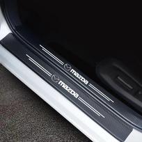 Automobilio durelių slenksčių juostos - Mazda / 9 vnt. (priekinių ir galinių durelių slenksčių juostos x 2 + Bagažinės slenksčio juosta)