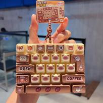 26-key Cat Pudding Decompression Color Keyboard Cartoon Clicker Backpack Pendant Mobile Phone Car Key Chain Home Decoration brown