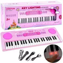 Vaikiškas pianinas su mikrofonu ir šviečiančiais klavišais, rožinis