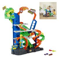 Hot Wheels City Ultimate T-Rex Garage with 2 Toy Cars & Storage for 50+, Race & Stunt, Dino Nemesis