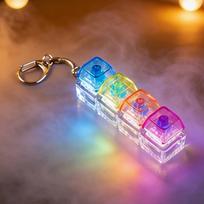 LED šviečiantis spragsėjimo raktų pakabukas Fidget žaislas, kristalinis sensorinis žaislas streso malšinimui, nešiojamas Fidget įrenginys suaugusiems ir vaikams gray