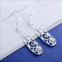 Vintage Palace-Style Hollow Carved Water Drop Earrings white