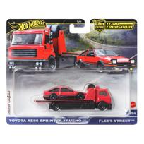 Hot Wheels Premium Team Transport vilkikas su lenktyniniu automobiliu (atsitiktinis rinkinys)